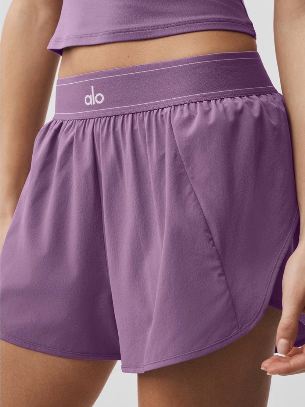 ALO Yoga match point shorts in plum kiss color